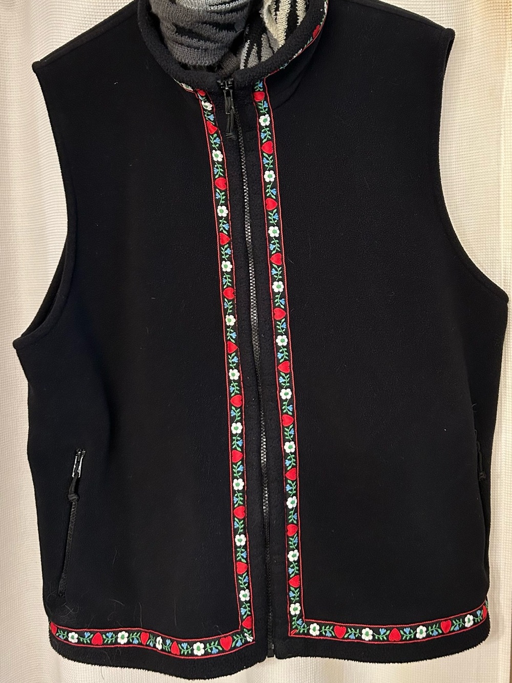 Wintergreen black vest with Nordic ribbon trim. Women’s size XXL
